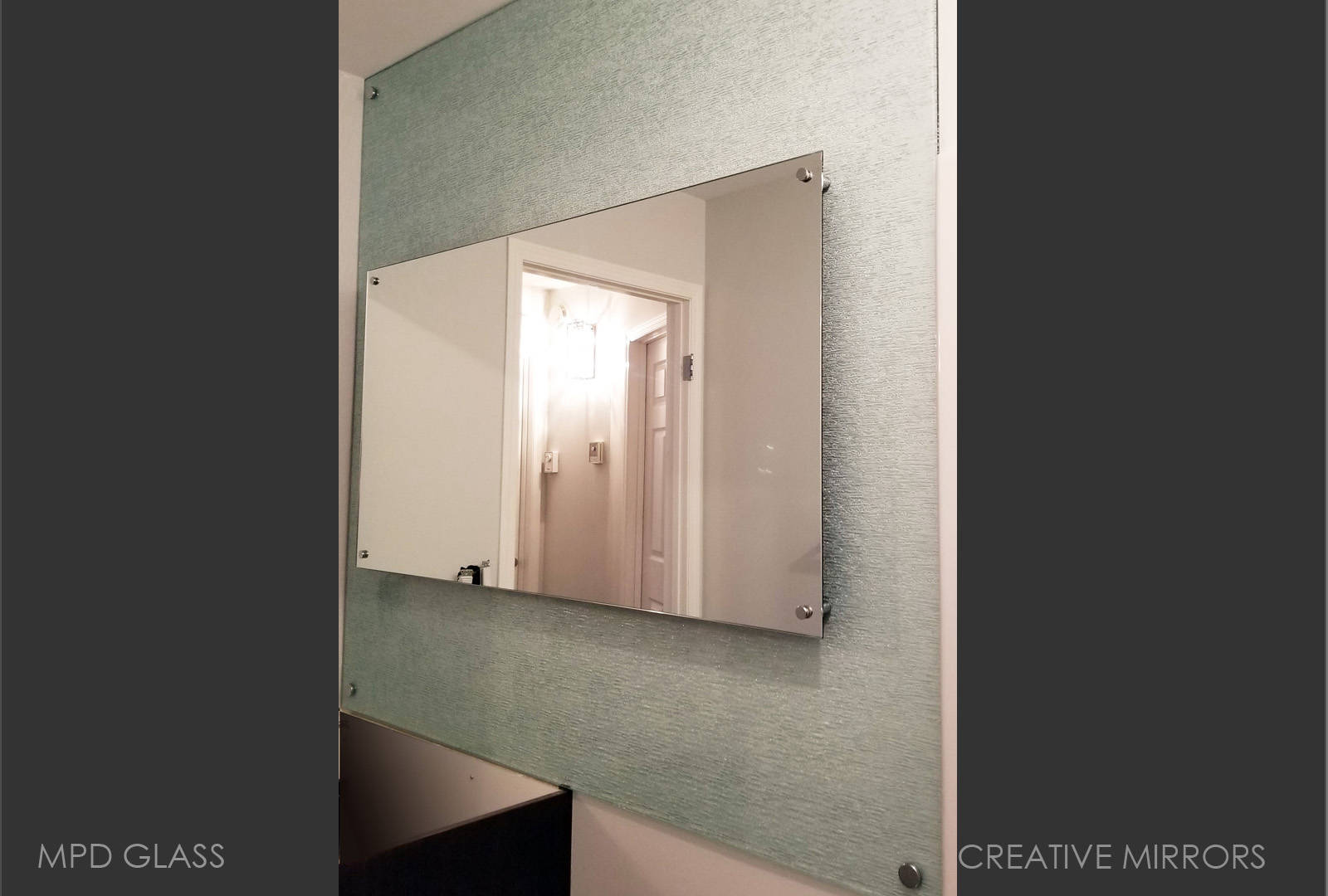 Mirror mounted on Textured Glass